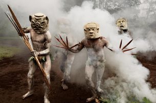 Celebration with masked men