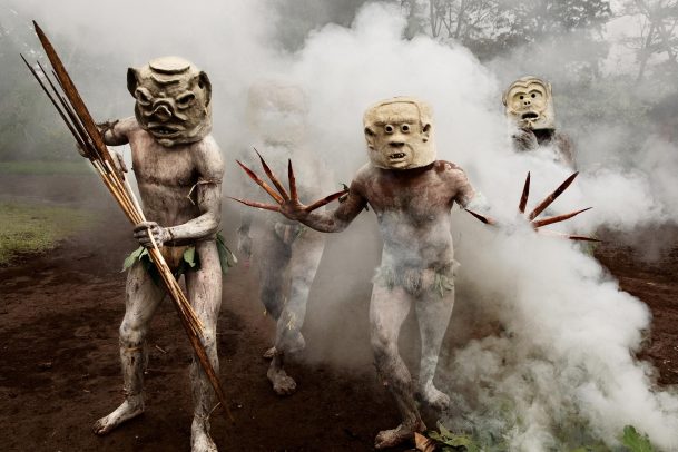 Celebration with masked men