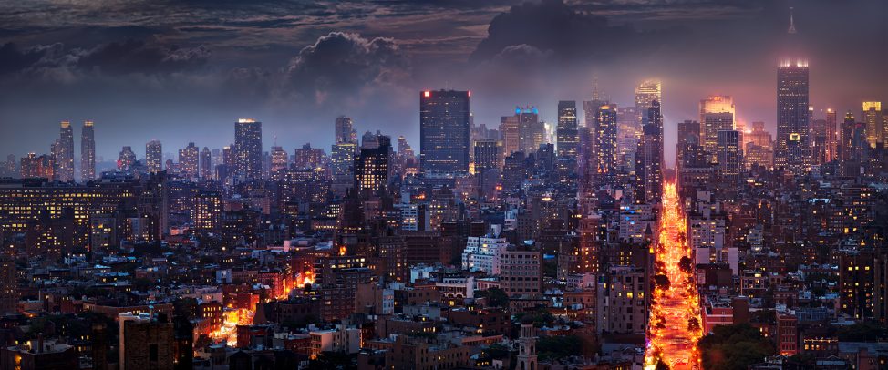 view of a city with skyscrapers at night