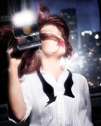 woman taking pictures with a 
