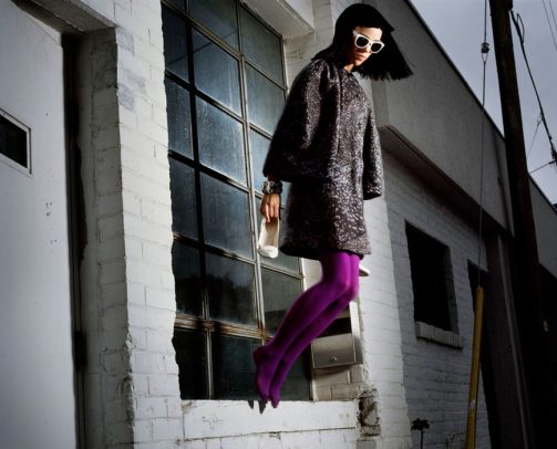 woman with coat and purple 