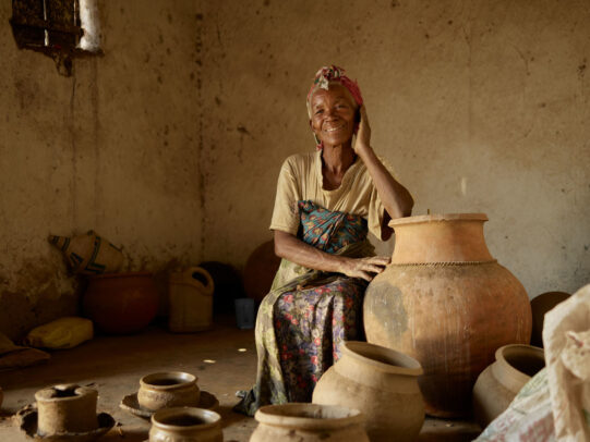 an old ethiopian lady with her post  