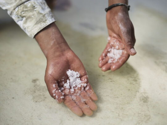 hands showing salt crystal