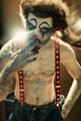 a clown smoking