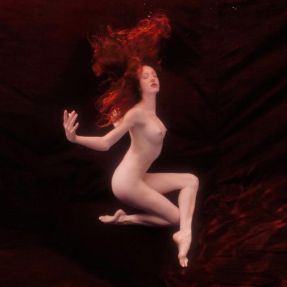 redhead girl underwater