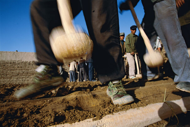 man working with hammers
