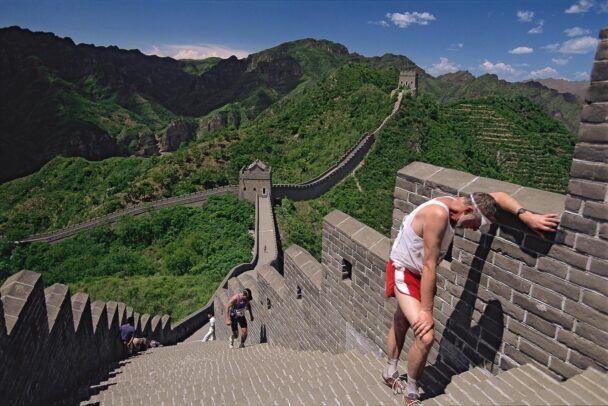 A marathon runner taking breath on the great wall