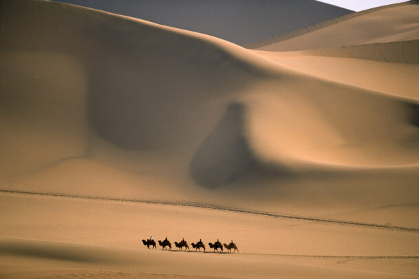 This windswept dune was known as the Sands That Sing to travellers like Marco Polo: “… when one of them chances to lag behind […] when he tries to gain his company again he will hear spirits talking and will suppose them to be his comrades, […] and thus shall a traveller oft times be led astray so that he never finds his party. And in this way, many have perished.” The Travels of Marco Polo, Vol 1 Bk 1, Ch 39 Taklimakan Desert, Gansu, China
