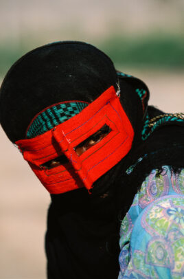 woman with black and red masks