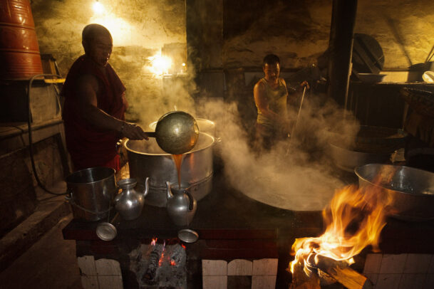 monks cooking in tibetan monastery