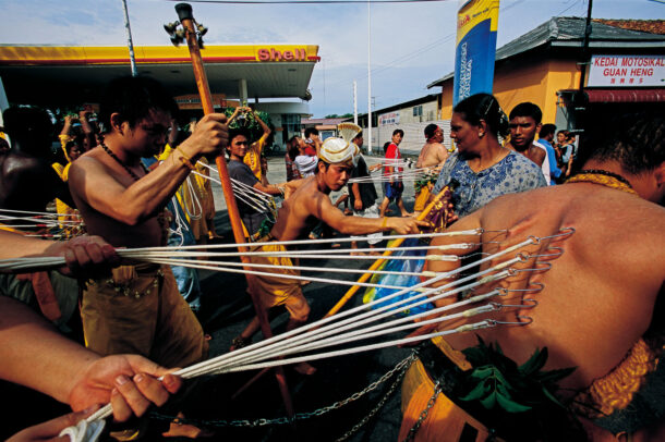 penitents' skin punctured with fishhooks