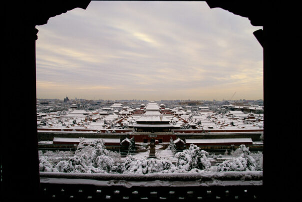 the forbidden city in Beijin covered in snow
